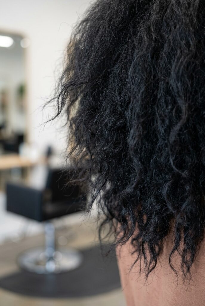 Close up of razor cut hair ends showing soft feathery tapered texture