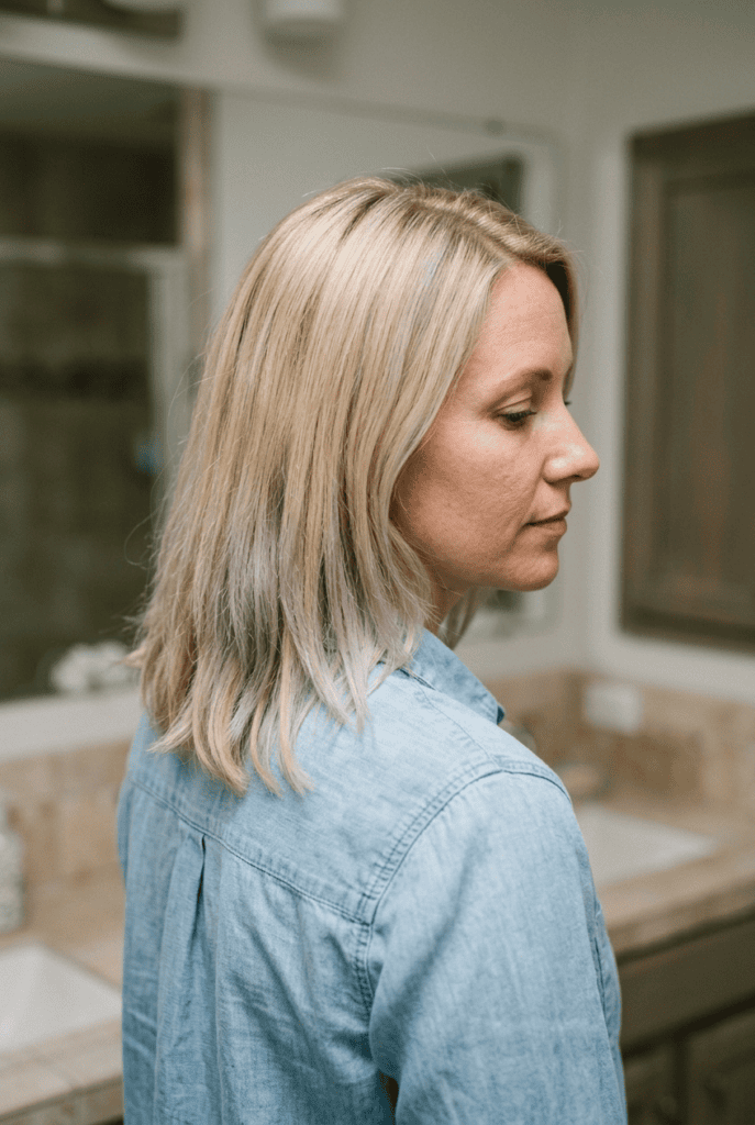 Common Mistakes That Turn Toner Purple or Gray Woman with overtoned lavender gray blonde hair mistake
