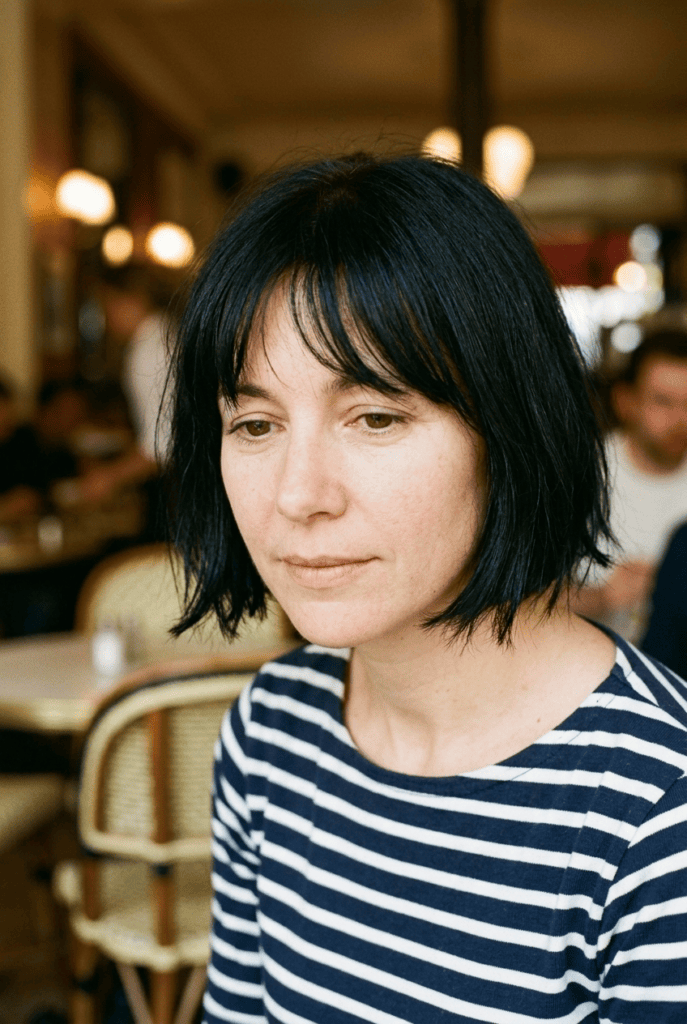 French bob at chin length with soft wispy bangs