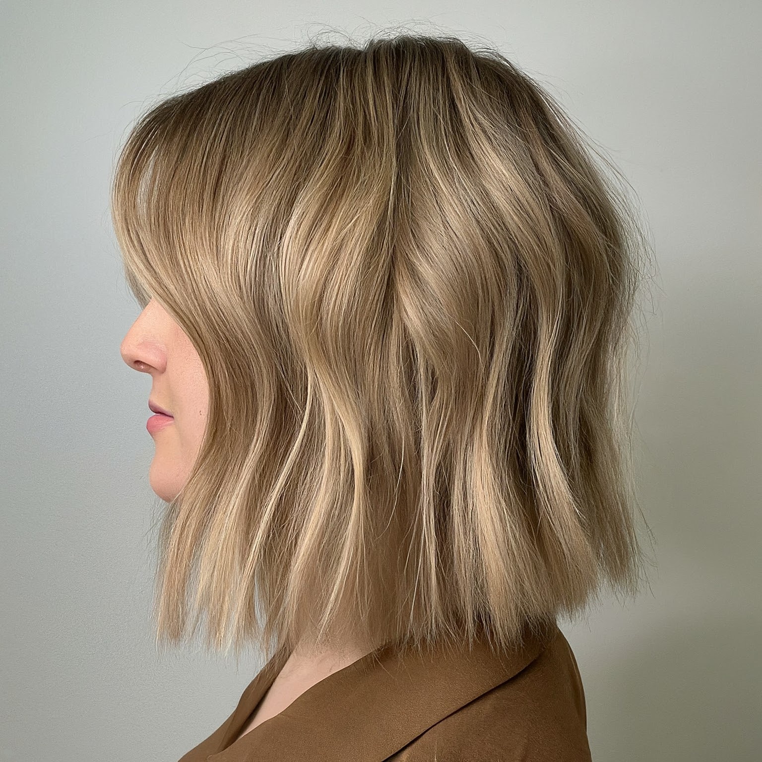 Layered Bob and Sand Blonde Hair Color