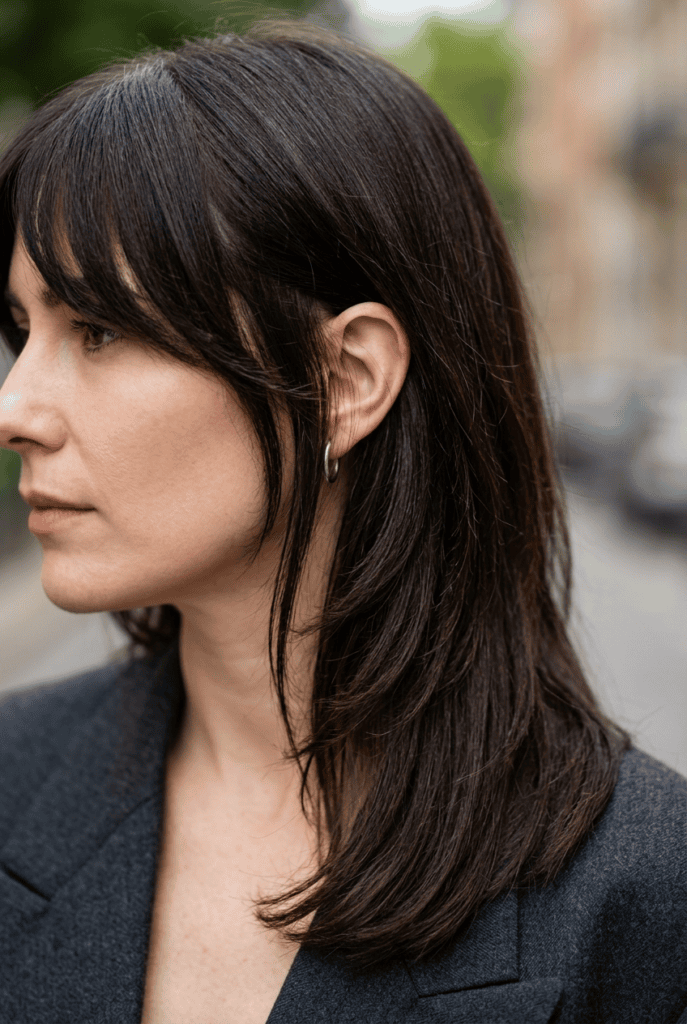 Long Layers with Peek-a-Boo Bangs