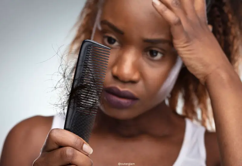 Shocked Woman Suffering From Hair Loss Problem