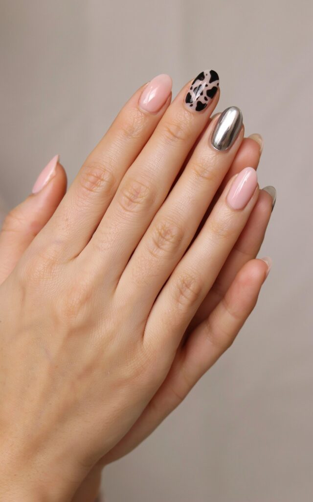 Teen girl hands with modern animal print accent nails